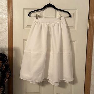 High waisted white knee length skirt